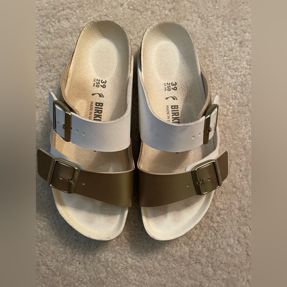White and gold Birkenstock Arizona Birko-Flor